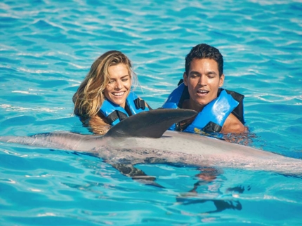 Swimming with dolphins at Bahía de Naranjo dolphinarium